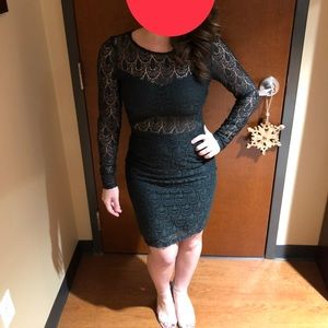 Bebe dark green mini dress with long sleeves